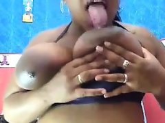 Fat ebony slut shows off her big tits
